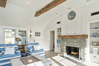 Example of a beach style living room design in Boston