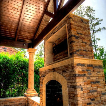 Grand home addition with outdoor kitchen see through fireplace - km