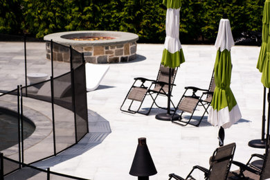 Example of a large minimalist patio design in Baltimore