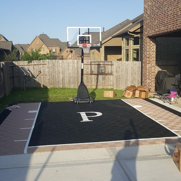 Sports Court Flooring Project - Outdoor Custom Basketball Court with a logo
