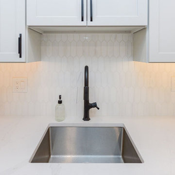 White Kitchen with Picket Backsplash