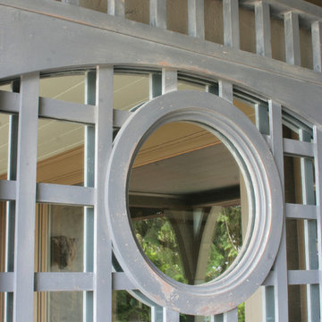 607 Mirrored treillage with distressed paint brightens up a dark porch