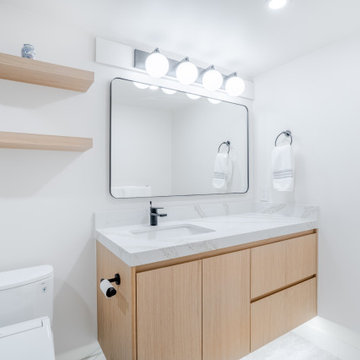 Modern Condo Vanity with Quartz Countertop – Woodcroft Capilano Bathroom Renovat