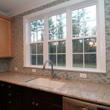 Kitchen sink and tile wall