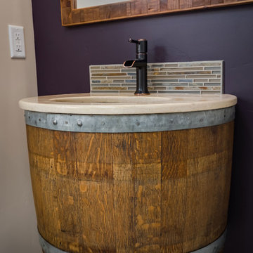 Eclectic Wine Barrel Sink Mounted to Wall in Washroom