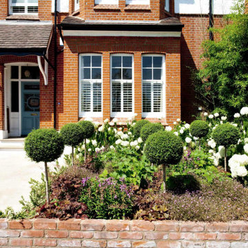 Semi-paved front garden driveway