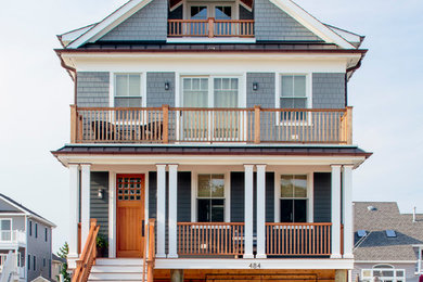 Example of a beach style exterior home design in Other