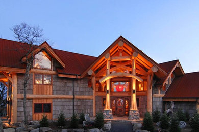 Rustic exterior home idea in Other