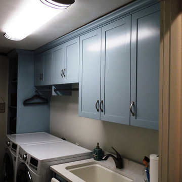 Mission Shaker Laundry Cabinetry and Space Organization in Custom Blue on Maple