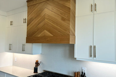 Example of a mid-sized trendy kitchen design in Toronto