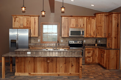 Example of a mountain style kitchen design in Cedar Rapids