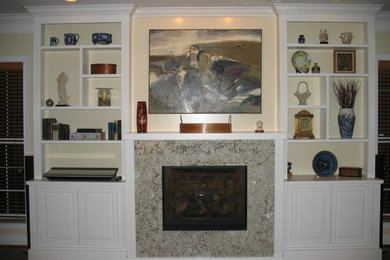 Living room - medium tone wood floor living room idea in DC Metro with beige walls