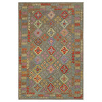 Bareens Designer Rugs - Rustic Turkish Kilim Williams Hand-Woven Wool Rug - 6'10'' x 9'8'' - Elevate the elegance of your home with this stunning hand-woven tribal Kilim wool rug. Meticulously crafted on a loom by the Nomad Turkman people using hand-spun wool and 100% natural vegetable dyes, these rugs are recognized for their repetitive geometric patterns, incorporating naturalistic floral and traditional designs. The contemporary fashion palette results in bold, sharp patterns that are incredibly versatile, as the pattern is the same on both sides. These reversible rugs feature a lighter shade on one side and brighter colors on the other, providing versatility according to preference. These unique rugs are made by knotting short strands of different colors onto the warps and securing them by tightly pressing the wefts. The designs are created by interweaving the various colored wefts and warps. Kilims are known for their exceptional durability and versatility, making them truly unique rugs.  Product Details    Rug Size: 6'10'' x 9'8''  Material: 100% Wool  Style: Kilim, Flat Weave, Dhurrie, Turkish, Southwestern, Rustic, Tribal  Colors: Brown, Rust  Weave Type: Hand-Woven, Handmade  Pile Height: Less than 0.25 inch