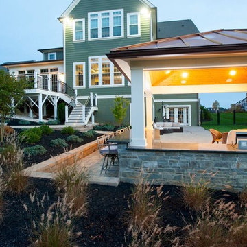 Design Builders Trex deck and outdoor kitchen with copper roof pavilion in Fulto