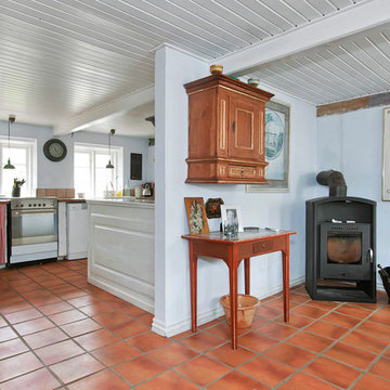 Brændeovnen hygger i hjørnet