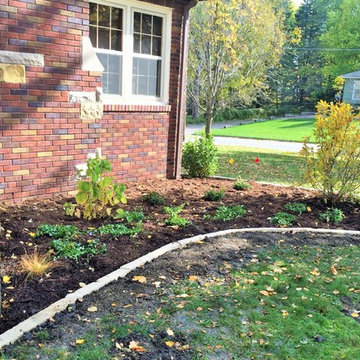 Limestone edging foundation planting