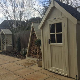 This is an example of a small modern detached garden shed in Other.