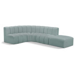 Meridian Furniture - Arc Vegan Leather Upholstered 5-Pc. L-Shaped Modular Sectional, Green - Unleash modern opulence with the Arc Vegan Leather 5pc. Sectional. Crafted for the modern connoisseur, this Sectional injects an air of refined luxury into any space. Its sleek silhouette, upholstered in supple mint green vegan leather, exudes timeless sophistication while the deep channel tufting adds textural intrigue, further elevating the chair's visual appeal. The modular design makes it a versatile chameleon, effortlessly adapting to your evolving needs and preferences. Whether you envision it gracing a chic living room corner, basking in the glow of a bedroom window, or adding a touch of drama to a home office, the Arc seamlessly complements your unique interior aesthetic.