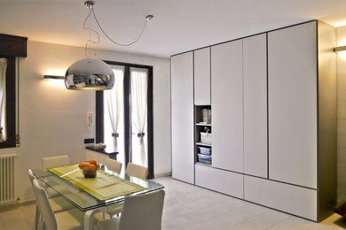 Idee per una sala da pranzo design di medie dimensioni