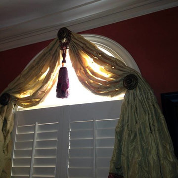 Elegant Swags Over Decorative Medallions
