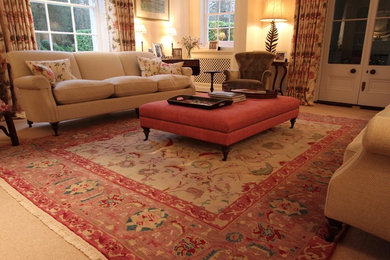 This is an example of a large traditional living room in Hampshire.