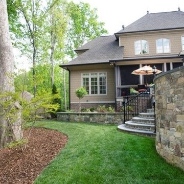Backyard landscape and stone walls.