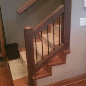 Rustic Oak Cabinetry with Reclaimed Barn Beam Accents