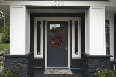 Arts and crafts home design photo in Vancouver