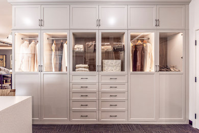 Mid-sized transitional carpeted and gray floor closet photo in San Francisco with glass-front cabinets and gray cabinets