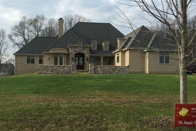 Inspiration for a large transitional exterior home remodel in Wilmington