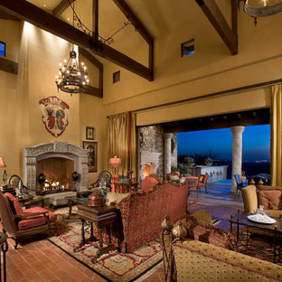Design ideas for a large mediterranean open plan living room in Phoenix with a music area, yellow walls, ceramic flooring, a standard fireplace, a stone fireplace surround and red floors.