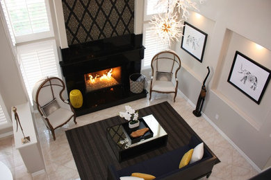 Inspiration for a mid-sized transitional open concept living room remodel in Orange County with a standard fireplace, a stone fireplace and no tv