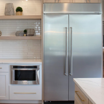 Oak, and White Kitchen with Matte Black Accents in Iowa Aspen Homes Farmhouse