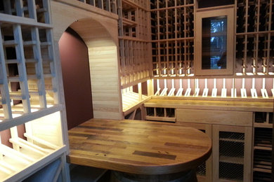 Wine cellar - large traditional wine cellar idea in Miami