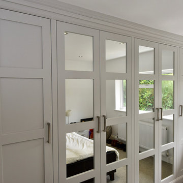 Bespoke fitted shaker style wardrobe with mirrored panels