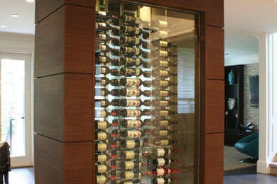 Inspiration for a contemporary wine cellar remodel in Vancouver