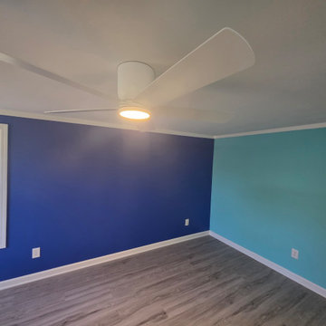 Two-Tone Blue Bedroom with Modern Ceiling Fan