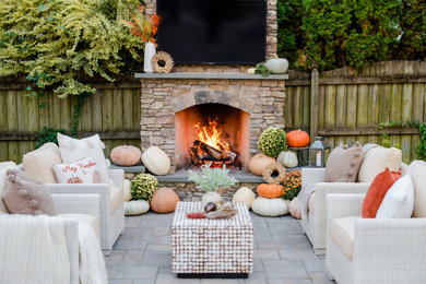 Patio - mid-sized traditional backyard concrete paver patio idea in Richmond with a fireplace and a gazebo
