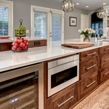 White Painted Cabinetry with Walnut island