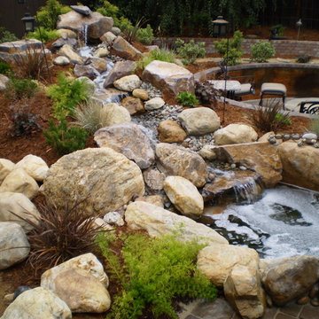 Waterfeatures, functioning creek bed and lowered outdoor seating area