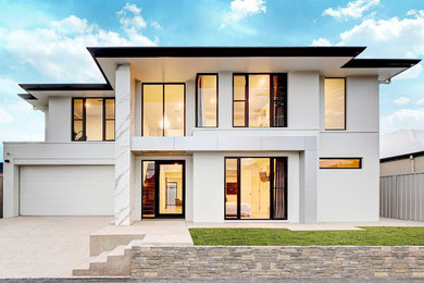 Design ideas for an expansive modern two-storey exterior in Adelaide.