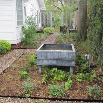 A wrap around garden with a fabulous water featurel!