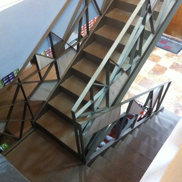 Escaleras par la ampliación de tienda comercial