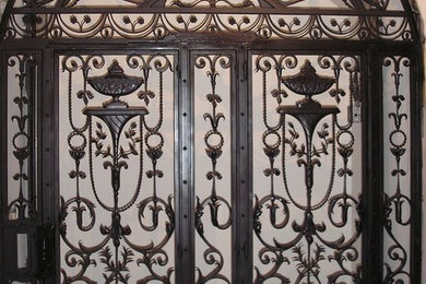 Example of a mid-sized classic entryway design in Chicago with a metal front door