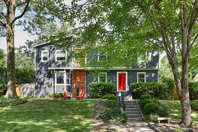 Inspiration for a large blue two-story house exterior remodel in DC Metro