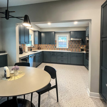 Vibrant and Colorful Kitchen with Custom Cabinetry and Calacatta Duolina Quartz