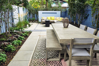 Inspiration for a mid-sized contemporary backyard concrete patio fountain remodel in Toronto with no cover