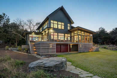 Example of a trendy gray two-story metal exterior home design in Providence with a metal roof