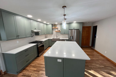 Eat-in kitchen - mid-sized transitional l-shaped eat-in kitchen idea in Other with shaker cabinets, quartz countertops and an island