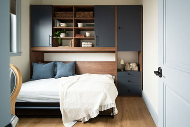 Example of a small french country guest bedroom design in Denver
